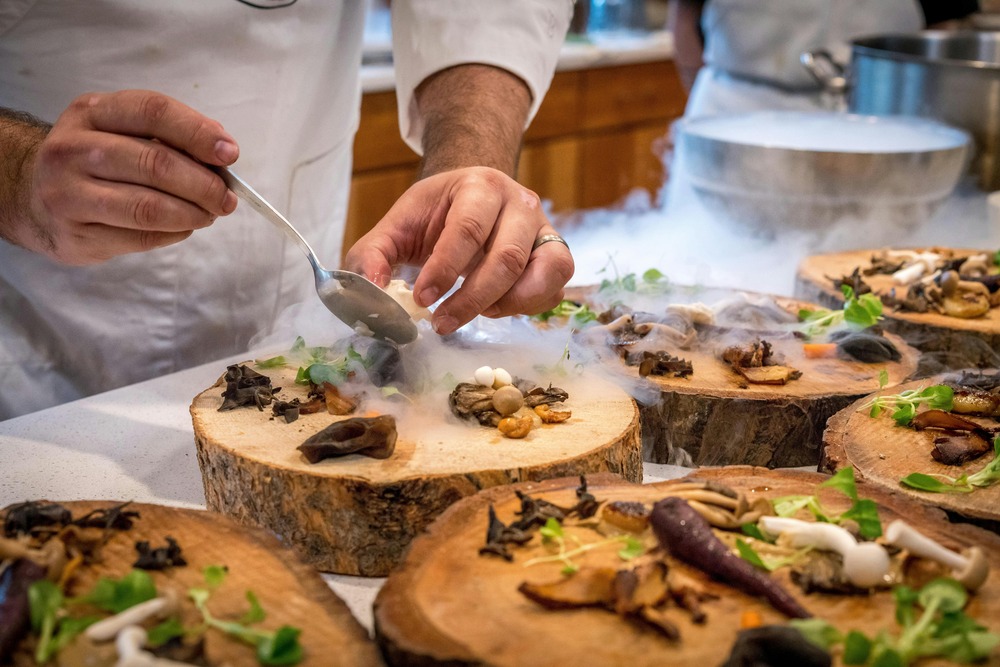 Private chef cooking gourmet dish